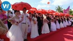 China: 100 Brautpaare heiraten nach westlichem Vorbild