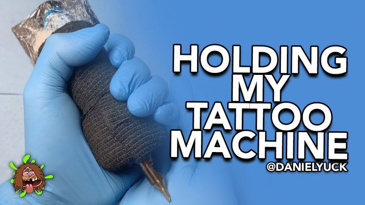 Holding A Tattoo Machine