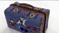 Two sides of Lakota life on a beaded suitcase